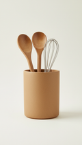 Matte ceramic utensil holder, 3/4 angle as default—elevates product form while revealing material details and function...